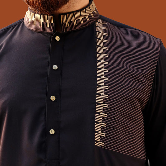 Black panjabi with decorative collar and chest panel on a brown background
