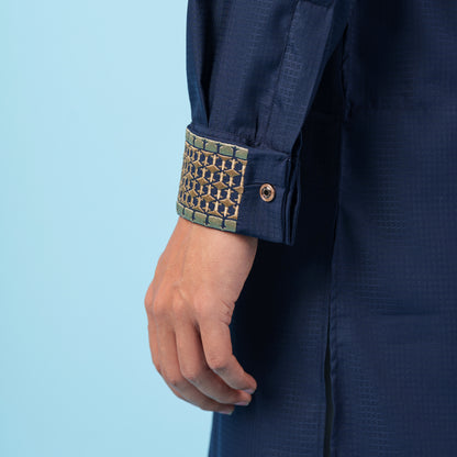 YAMAAN Navy blue Panjabi with patterned cuff against a light blue background