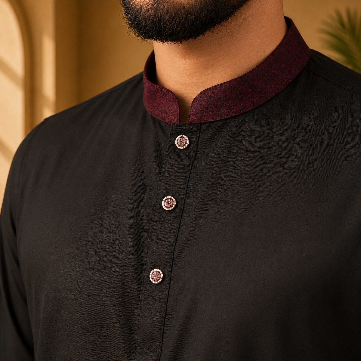 yamaan-royal-panjabi-black with a maroon collar against a neutral background