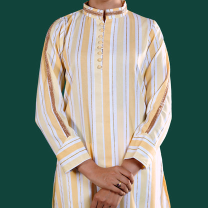 Yellow and white yamaan signature striped kurta with brown accents on a green background